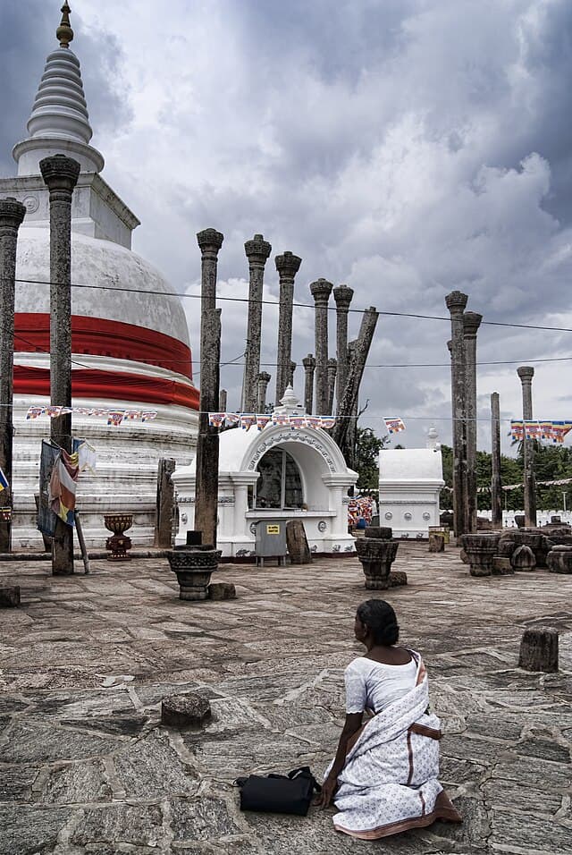 Devotee praying at Thuparamaya stupa
